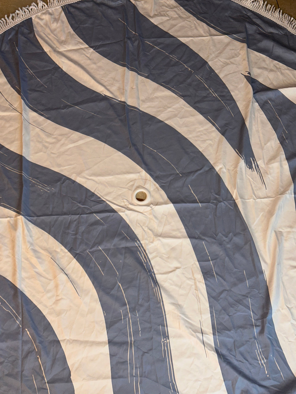 Il telo mare con foro centrale