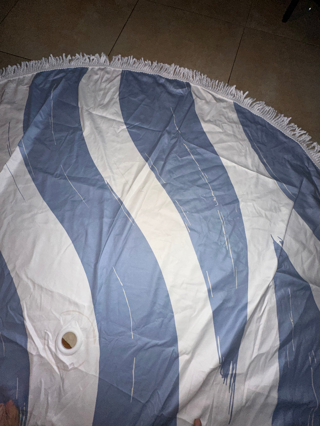 Il telo mare con foro centrale